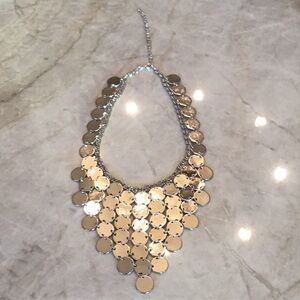 Silver Statement Necklace with Layered Design and Textured Discs